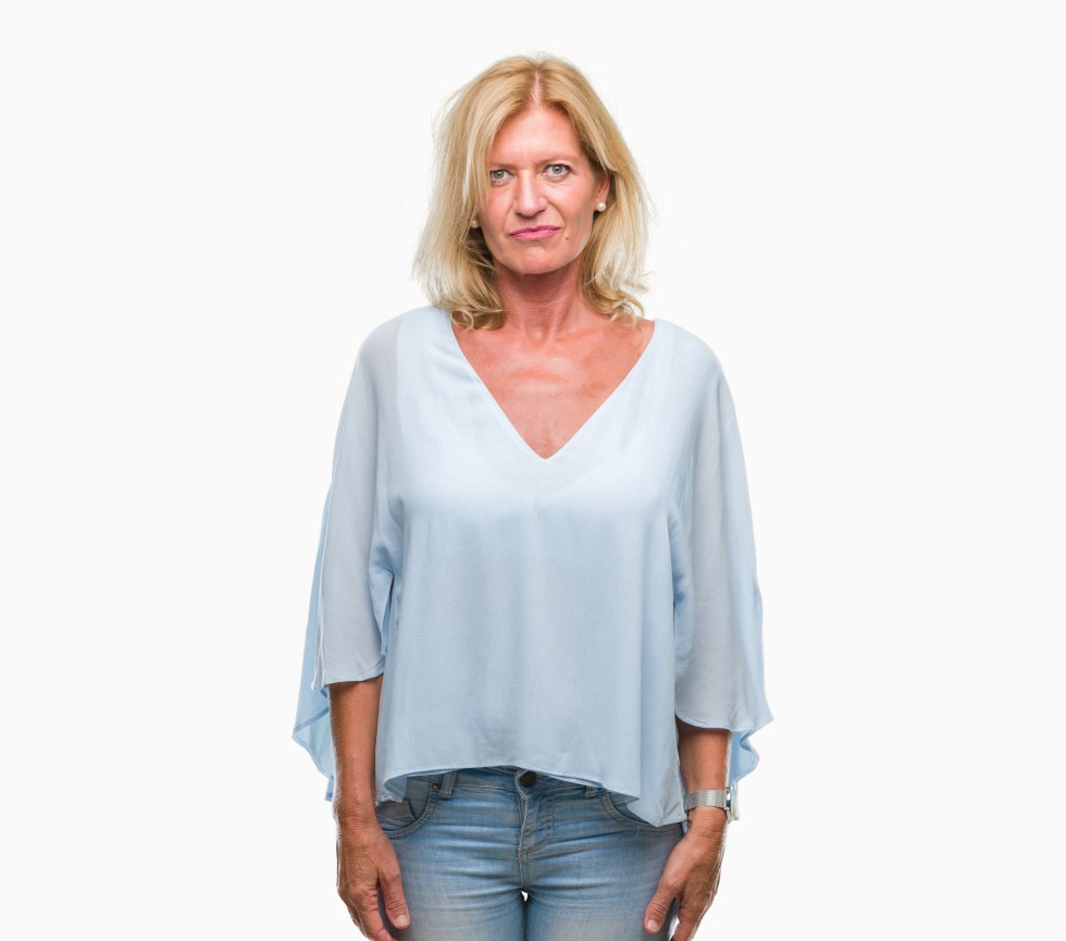 Middle age blonde business woman over isolated background depressed and worry for distress, crying angry and afraid. Sad expression.