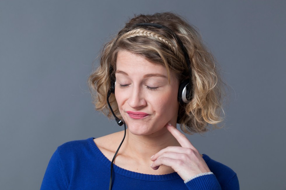 bored young female professional working for a call center