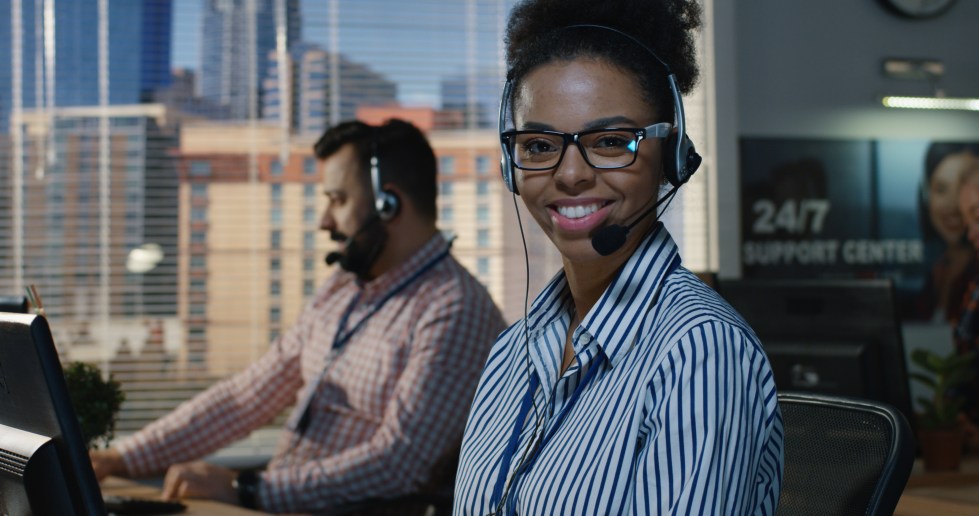 Woman working at his desk in a call center